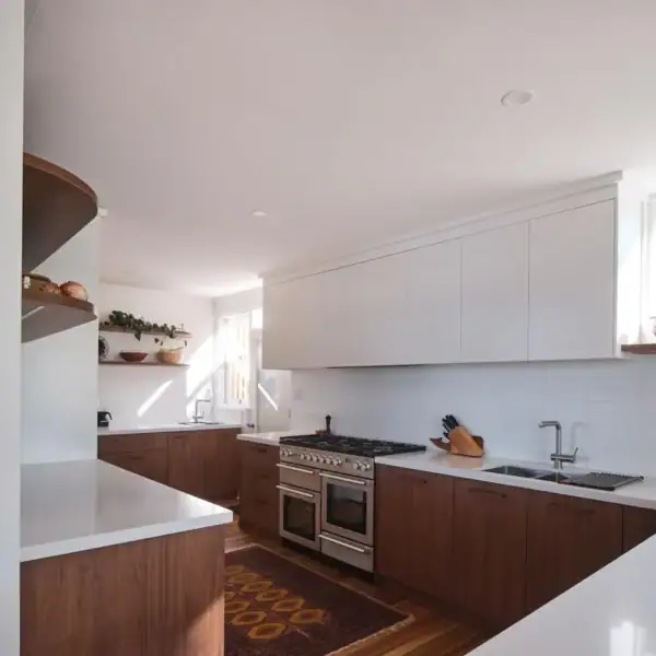 bespoke timber kitchen with stone benchtops and high end appliances