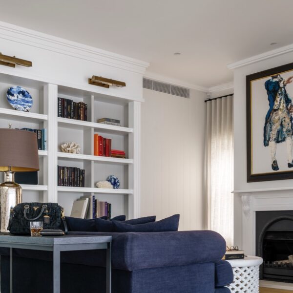 Austinmer coastal home living room with custom joinery and fireplace