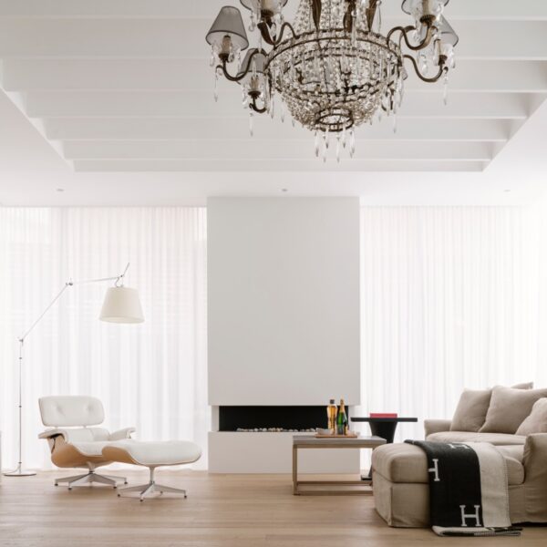 Austinmer coastal home living room with fireplace and chandelier