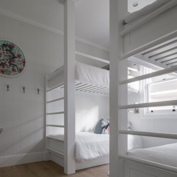 Austinmer coastal home bedroom with bunk beds and white interior