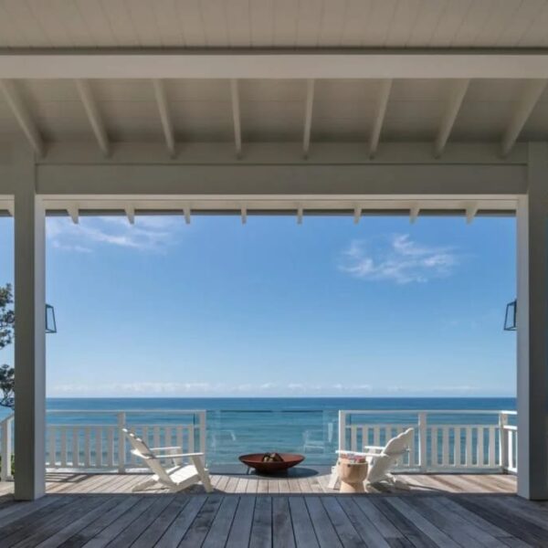 Austinmer coastal home deck framed ocean view with outdoor seating