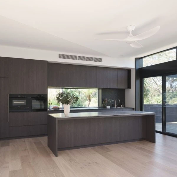 Bespoke kitchen cabinetry in Stanwell Park coastal custom home with timber joinery and modern finishes.