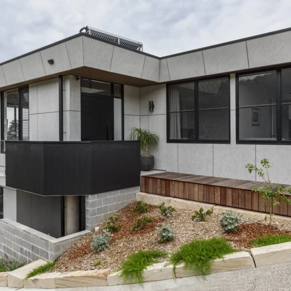 Front elevation of Stanwell Park No.3, a custom home built on a steep coastal site in Stanwell Park, NSW.